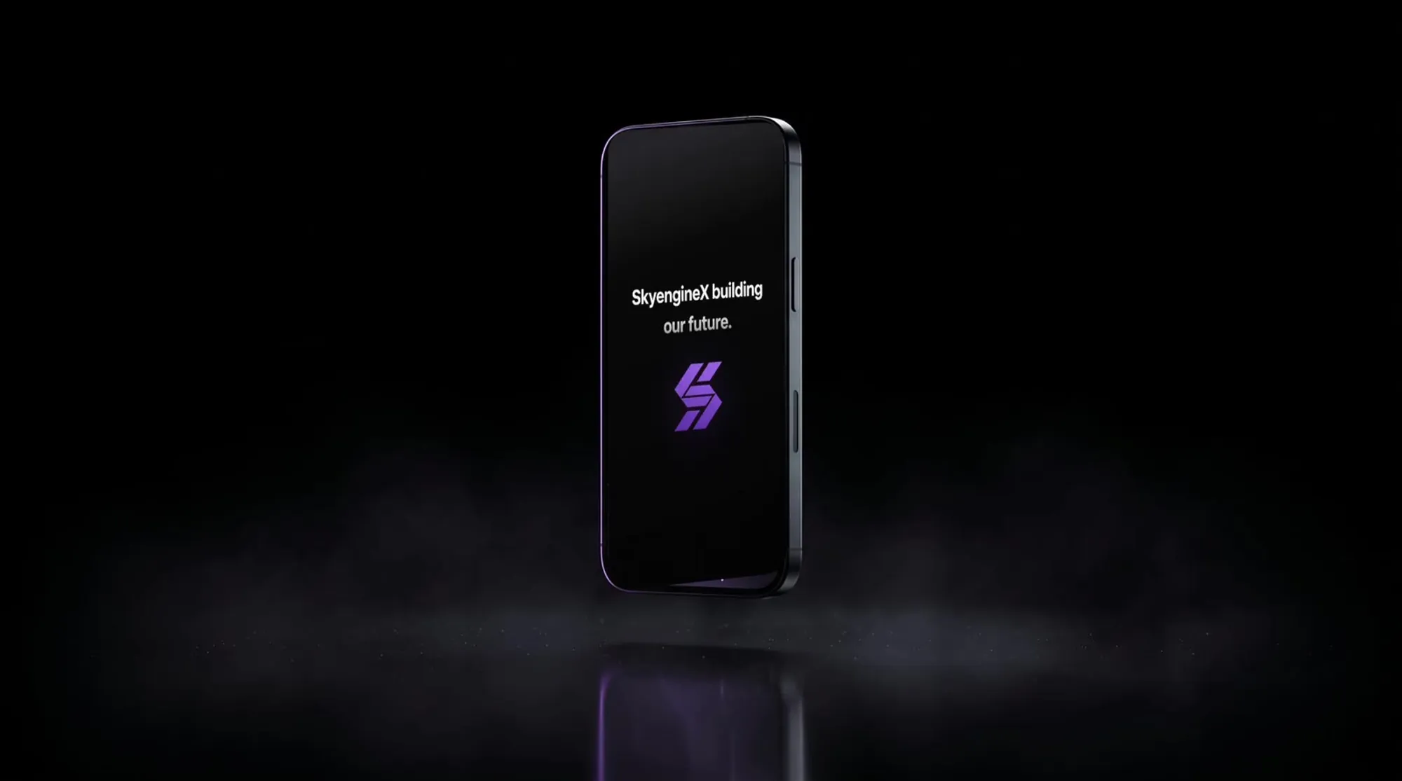 SkyEngineX Mobile running its launch sequence on a matte black phone in a dark studio